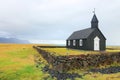 Budakirkja - the black church sits alone among a field of lava rock.